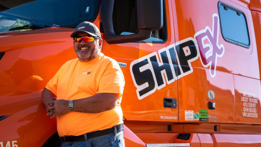 truck driver and orange truck