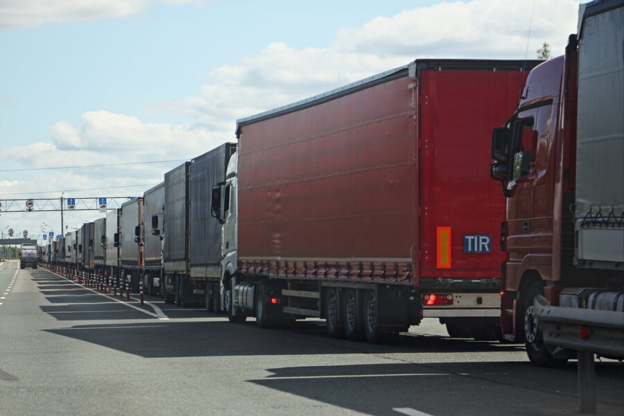 Row of trucks in traffic