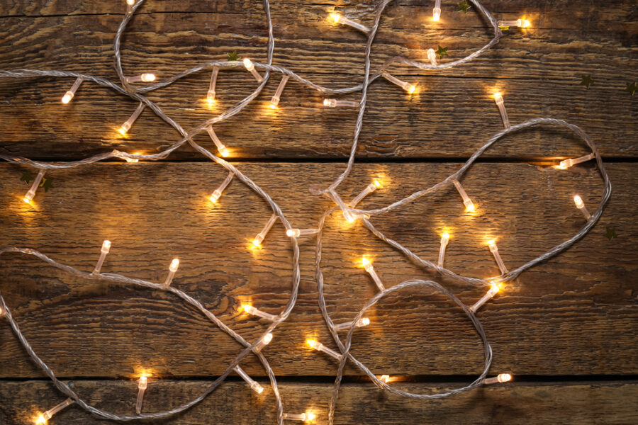 String of lights piled on wood boards