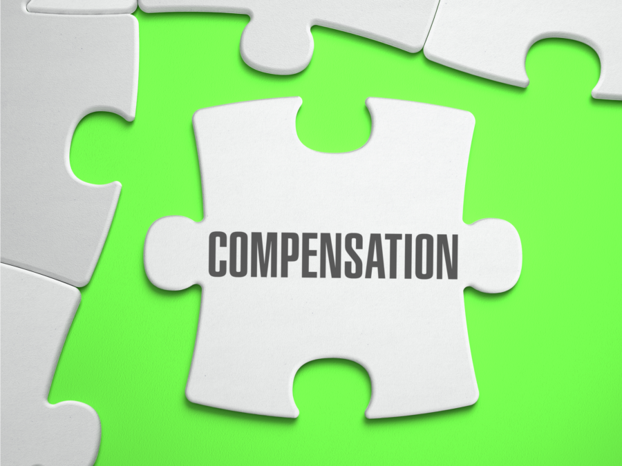 Compensation puzzle piece on green background
