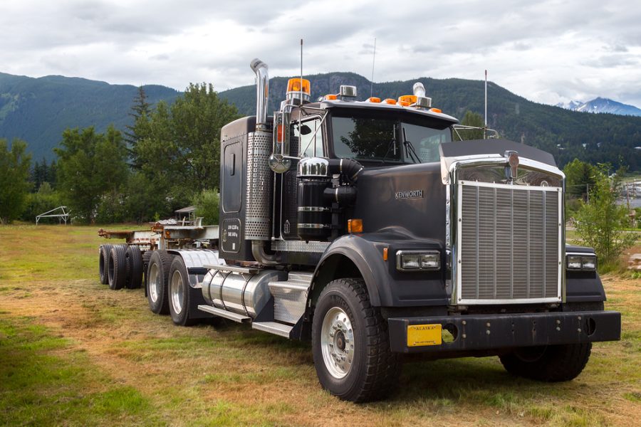 Haines, Alaska, USA - July 29th, 2017: A Kenworth truck parked on the field of Fort Sewart in Haines.