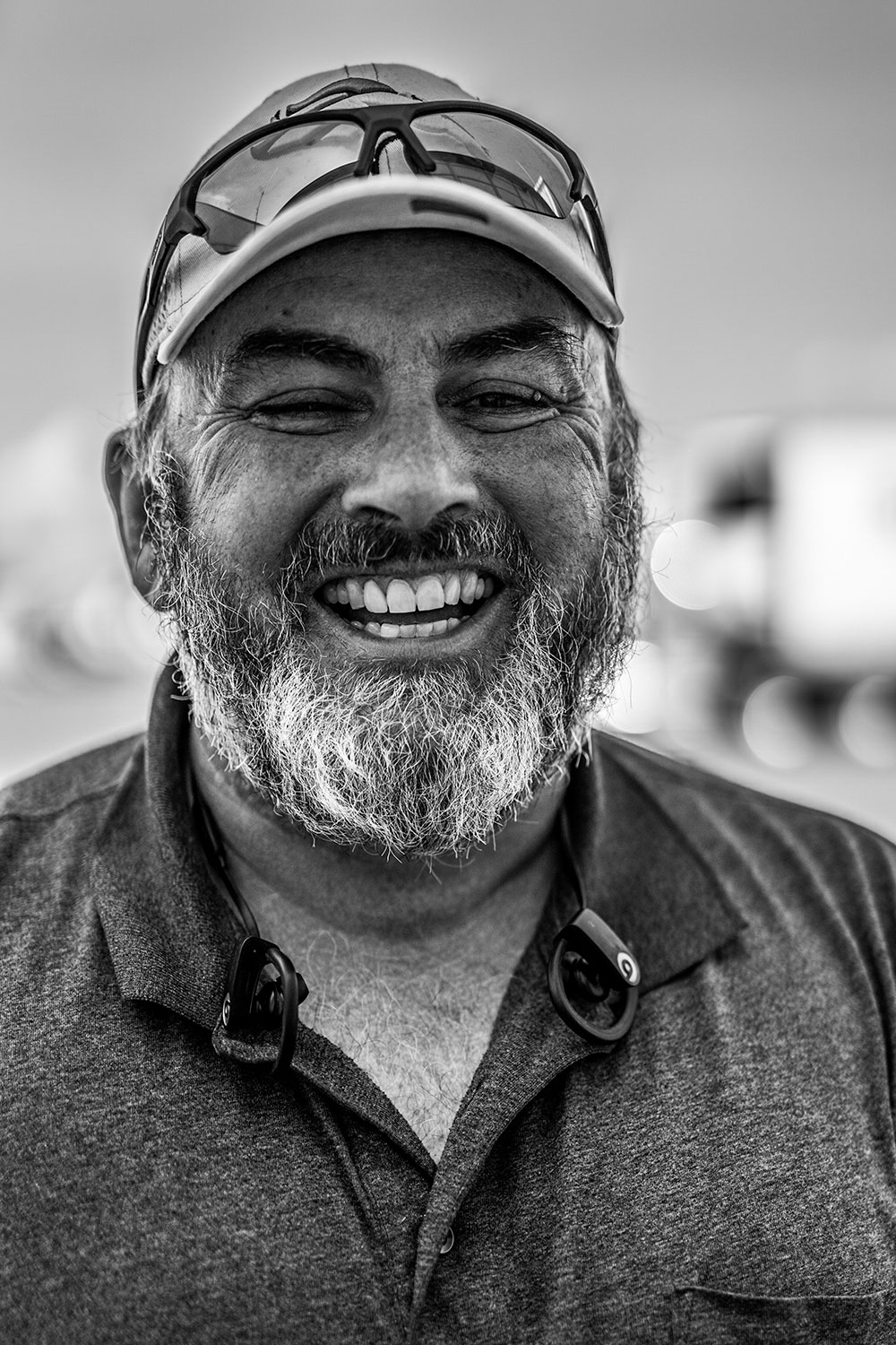 Black and White portrait of smiling driver