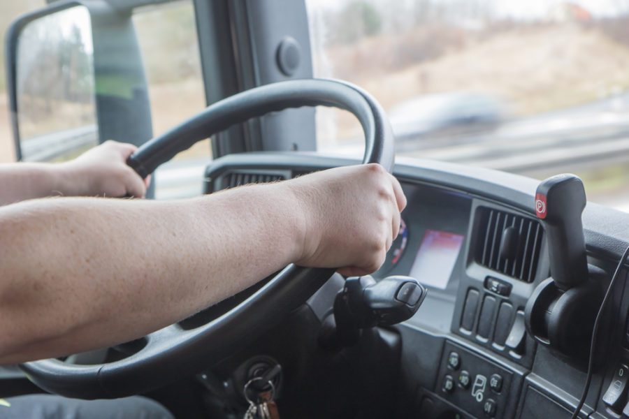 close up truck driver steering wheel