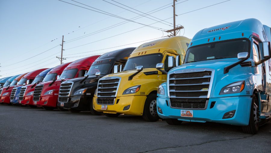 Colorful trucks parked in a row