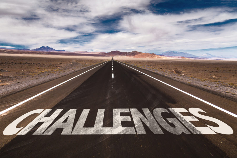 Challenges written on road