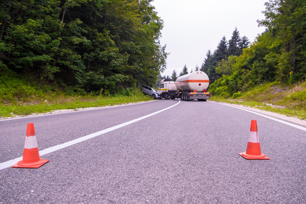 Tanker crashed into mini van with safety cones