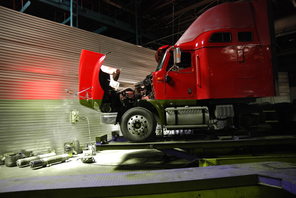 Open engine compartment red semi